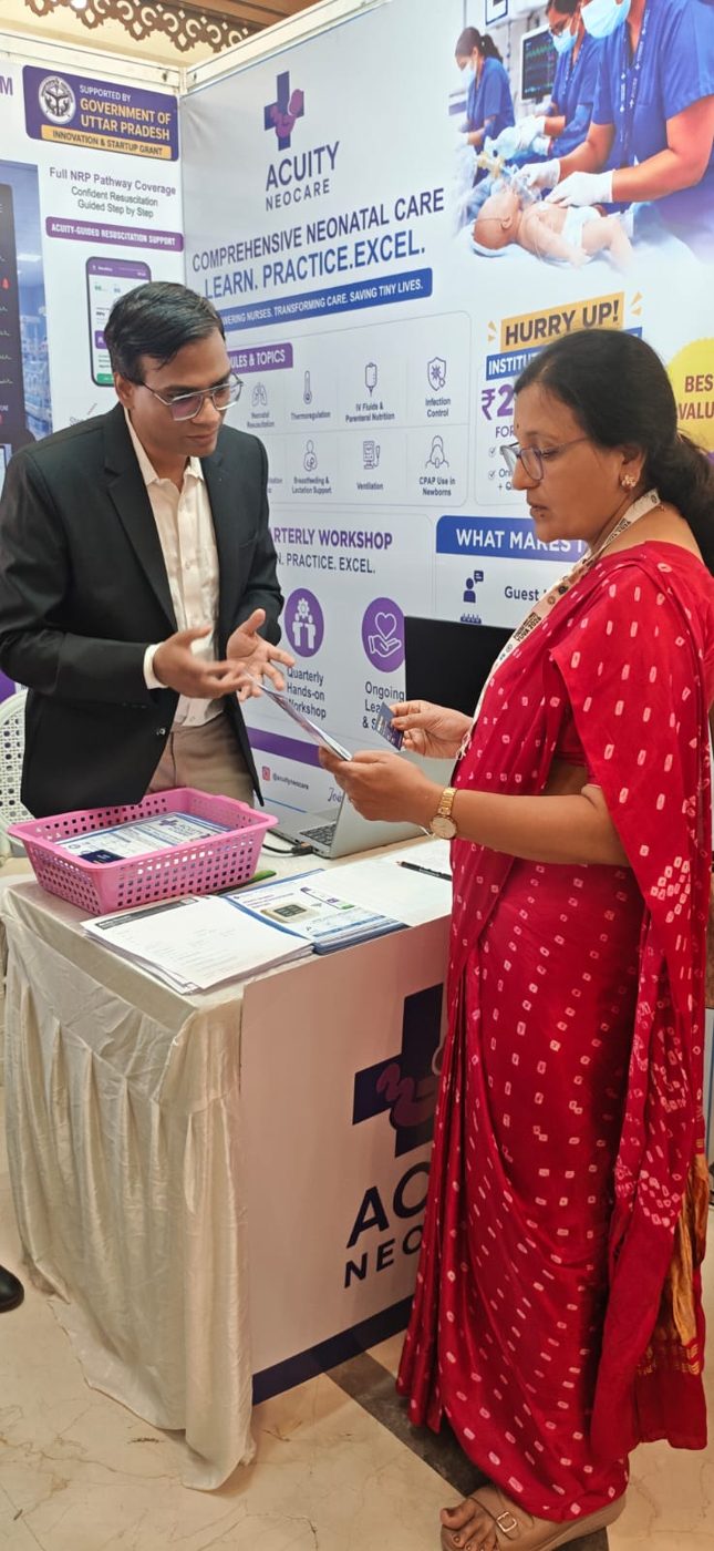 One-on-one conversation with a delegate at the stall