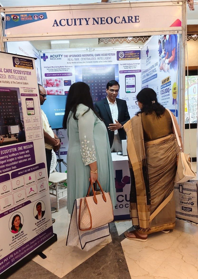 A busy Acuity Neocare stall with delegates in conversation