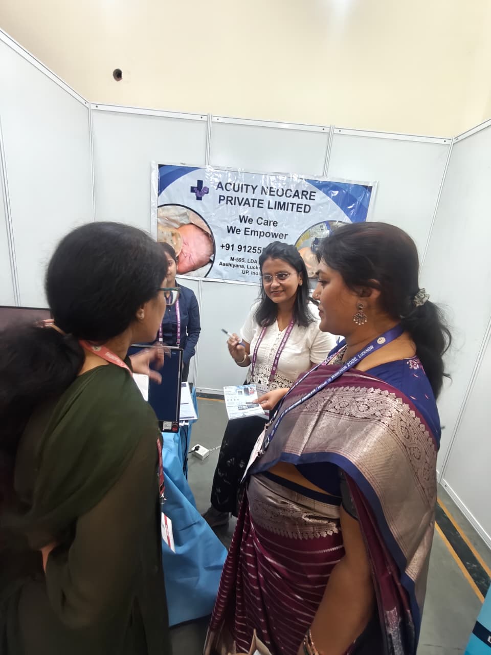 Delegates watching the live NeoRes monitor and app demo