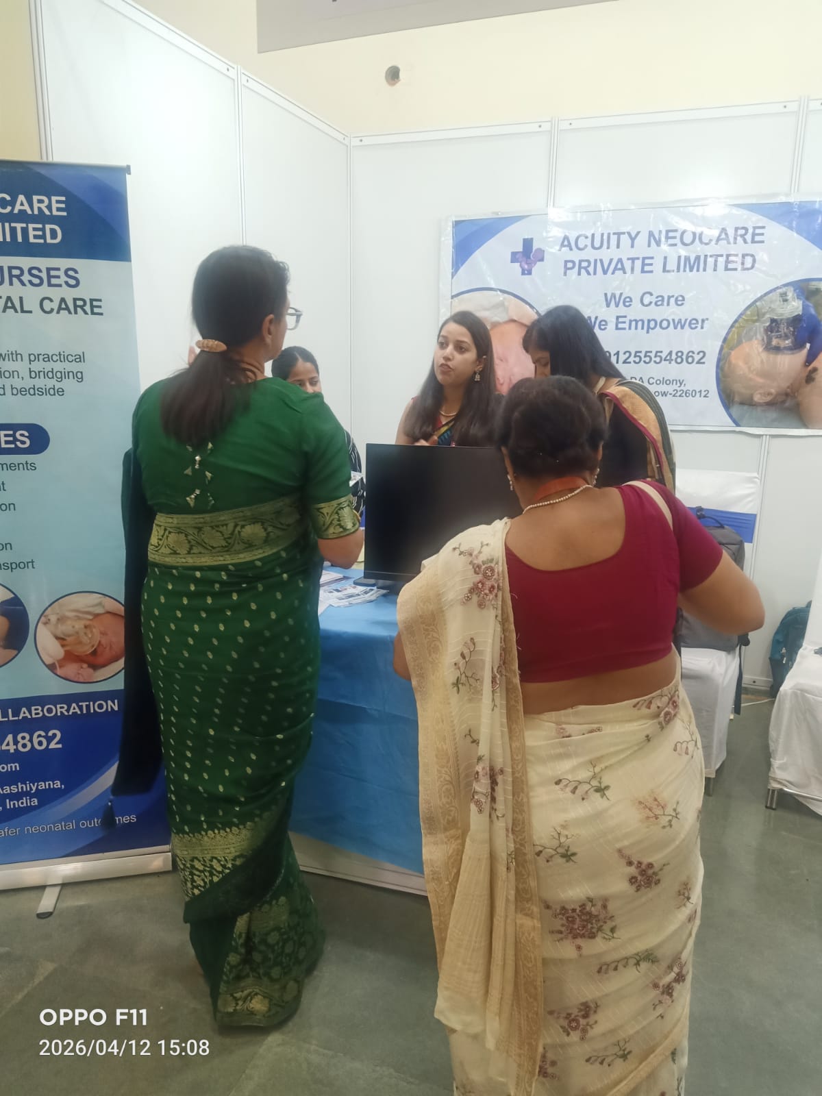 One-on-one conversation with a delegate at the booth